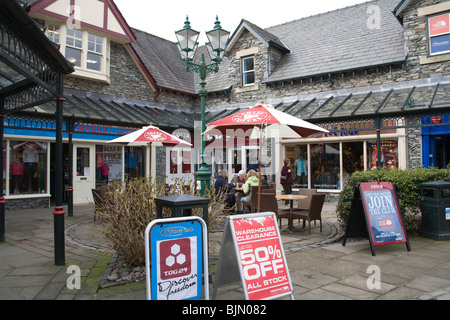 Ambleside Lake District Cumbria England UK People sitting outside a Costa Coffee house in this town popular with walkers Stock Photo