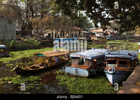 India, Kerala, Alappuzha, (Alleppey) North Canal, tourists on small shikara backwater tourist excursion boat Stock Photo