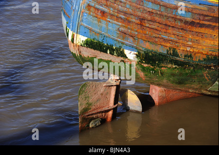 Stern and rudder gear of wooden fishing boat in Kirkcudbright Harbour, SW Scotland Stock Photo