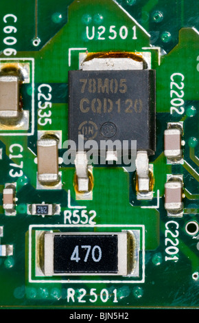 close up photograph of electronic components on a computer mother board Stock Photo