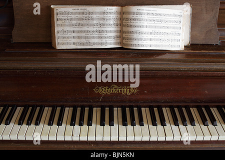 Hymnal resting on piano--'Harvard College' Stock Photo
