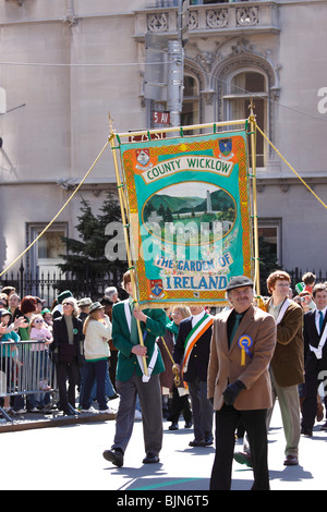 Marchers carry banner up 5th Avenue in New York City's annual St. Patrick's Day parade Stock Photo