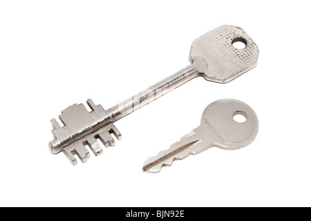 Two different kind of old fashioned keys isolated on white background. Stock Photo
