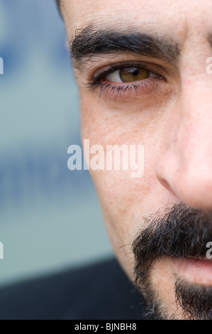 Closeup of a man's face looking at the camera Berlin Germany Stock Photo