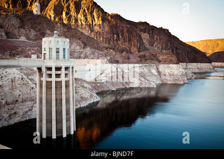 Marks along the canyon walls of Lake Mead at the Hoover Dam show the low water level due to over use of water resources Stock Photo