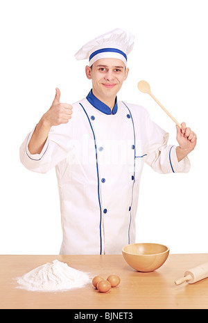 A cheerful chef preparing to cook with thumbs up Stock Photo