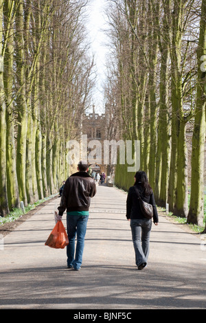 Two university students at Trinity College Cambridge University walking in Trinity college, UK Stock Photo