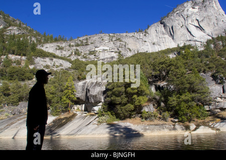 Byorn Barfoed looks out over the emerald pool, in Yosemite National Park. Stock Photo