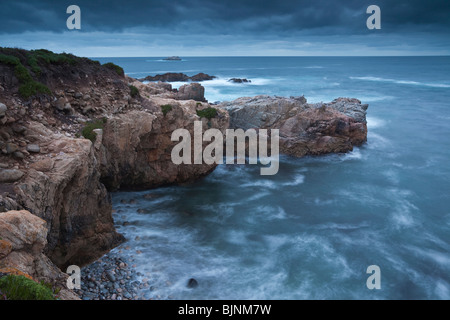 Evening surf at the coastal rocks in Garrapata State Park on the Pacific coast of California Stock Photo