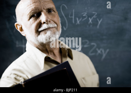 Male school teacher with books Stock Photo