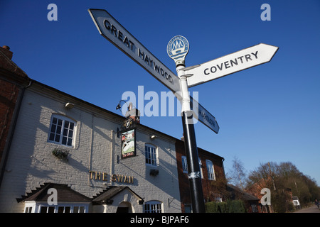 Canal signpost on the towpath beside The Swan public house, Fradley Junction, near Lichfield, Staffordshire, England. Stock Photo