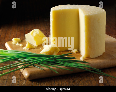 Truckle of English cheddar cheese food photos Stock Photo