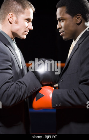 Side profile of two businessmen boxing Stock Photo - Alamy