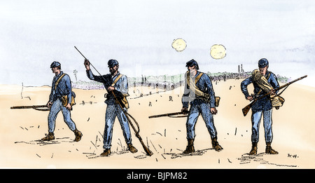 Union infantry scouts 'feeling the enemy' ahead of the main force. Hand-colored woodcut of a Winslow Homer illustration Stock Photo