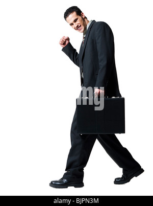 Businessman carrying a briefcase Stock Photo