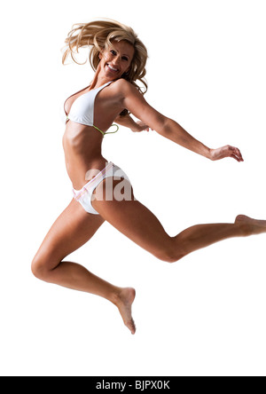 Female swimmer jumping Stock Photo