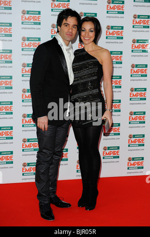 RAMIN KARIMLOO & GUEST 2010 JAMESON EMPIRE AWARDS GROSVENOR HOUSE HOTEL PARK LANE LONDON ENGLAND 28 March 2010 Stock Photo