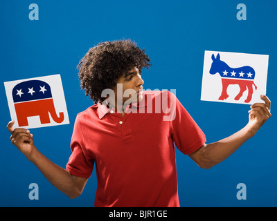young man choosing between political parties. Stock Photo