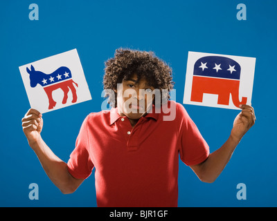 young man choosing between political parties. Stock Photo