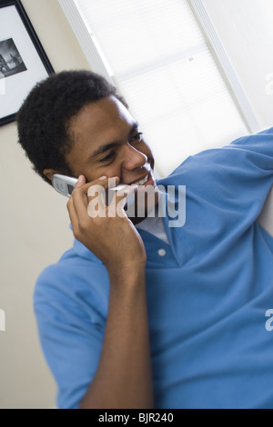 Teenage boy on cellular phone Stock Photo