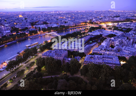 Fantastic view to Paris from Eiffel Tower to Seine river and buildings in illumination Stock Photo
