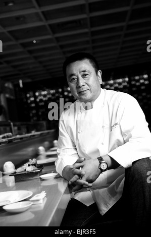World-renowned Japanese chef Nobu Matsuhisa sits at the counter ofhis restaurant in central Tokyo, Japan. Stock Photo