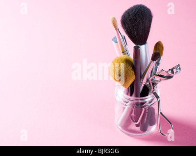 Assorted makeup brushes and cosmetics instruments. Stock Photo