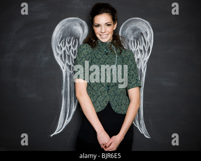 woman with angel wings Stock Photo