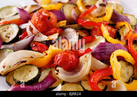 Mixed roast vegetables, onions, peppers and courgette food photos Stock Photo