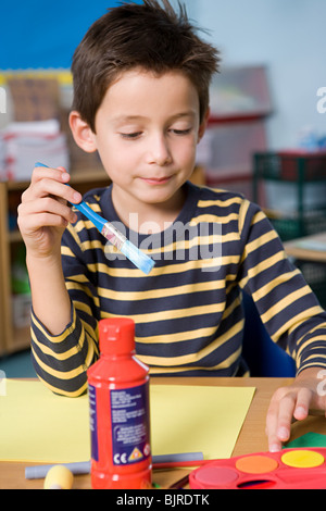 Boy painting Stock Photo