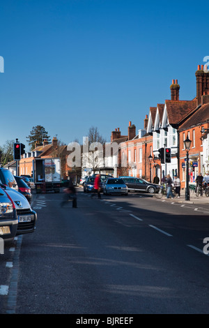 View along the busy High Steet in Odiham, Hampshire, Uk Stock Photo