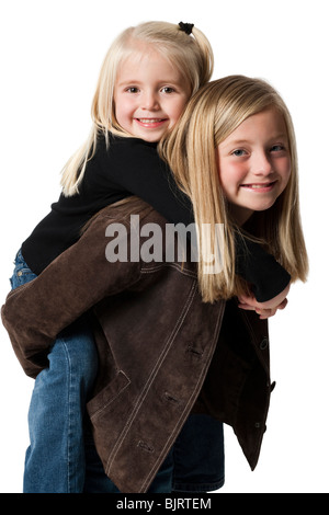 Young sisters posing Stock Photo