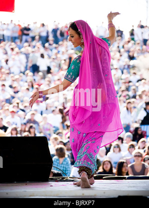 USA, Utah, Spanish Fork, mid adult dancer in traditional clothing performing on stage Stock Photo