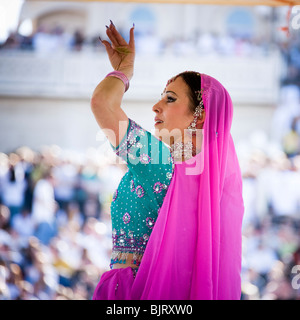 USA, Utah, Spanish Fork, mid adult dancer in traditional clothing performing on stage Stock Photo