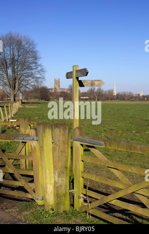 A gate on a footpath. The city of worcester in the distance Stock Photo