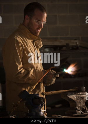 USA, Utah, Orem, welder using torch Stock Photo
