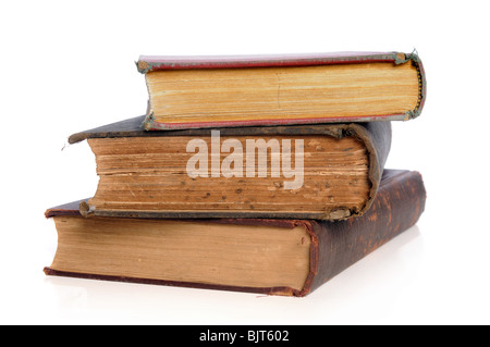Old books in a pile isolated over white background Stock Photo