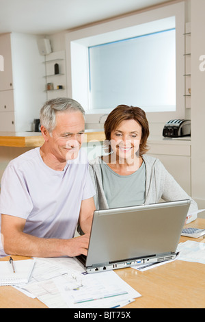 A couple sorting out home finances Stock Photo