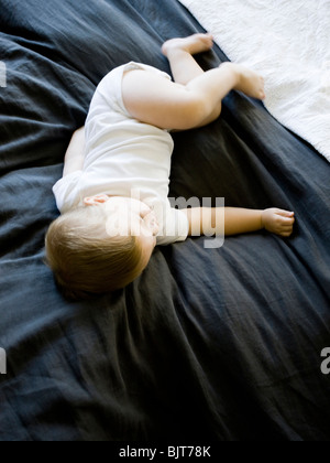 USA, Utah, Provo, Baby boy (18-23 months) asleep on bed Stock Photo