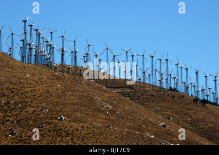 Wind turbines at the Tehachapi Wind Farm (2nd largest in the world) at sunset, Tehachapi Mountains, California Stock Photo