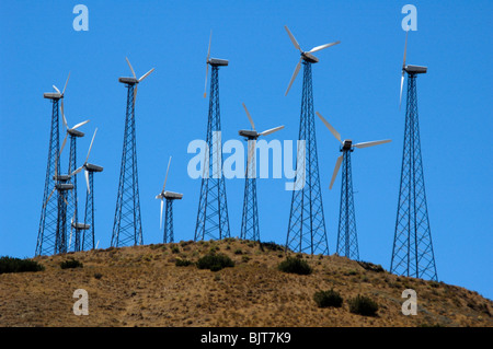 Wind turbines at the Tehachapi Wind Farm (2nd largest in the world) at sunset, Tehachapi Mountains, California Stock Photo