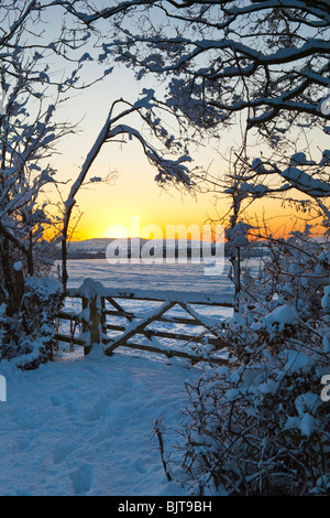 A winter sunset from the Cotswold lane between Stanton & Stanway, Gloucestershire UK Stock Photo