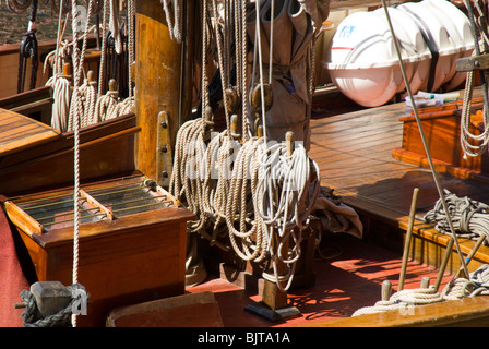 Decking and ropes on a sailing ship, the Zebu.  Albert Dock, Liverpool, Merseyside, England, UK Stock Photo