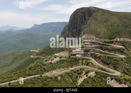 The Serra da Leba pass. A winding road leading down the Chela escarpment towards Namibe Province. Huila Province, Angola. Africa Stock Photo