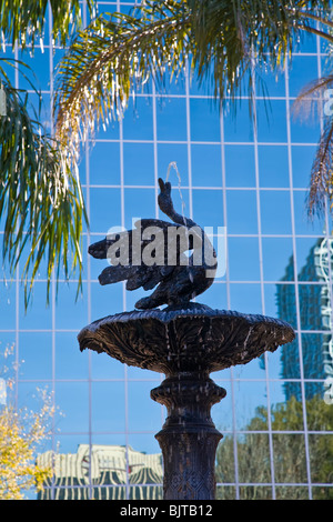 Fountain aganist glass modern building in downtown Orlando Florida Stock Photo