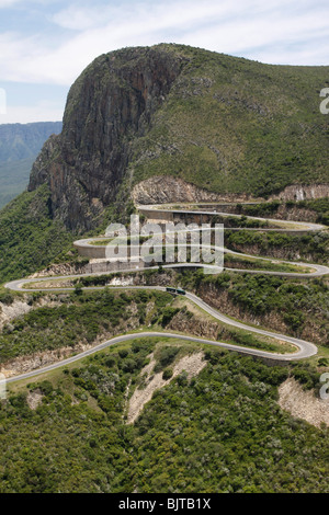 The Serra da Leba pass. A winding road leading down the Chela escarpment towards Namibe Province. Huila Province, Angola. Africa Stock Photo