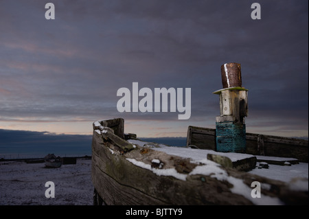 The chimney stack of an abandoned fishing boat at Dungeness,  Kent Stock Photo