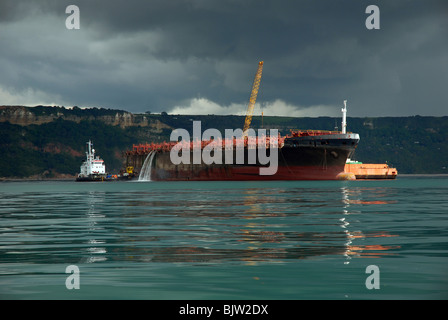 Napoli container ship wrecked off Branscombe beach, South Devon, Lyme Bay. being broken up by salvors, August 2007 Stock Photo