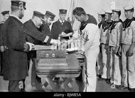 Pay day on board HMS 'Royal Sovereign', 1895. Artist: Gregory & Co Stock Photo