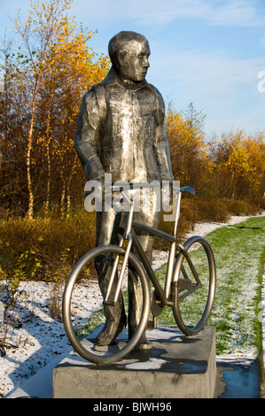 Sculpture depicting a male cyclist, Lord Sheldon Way, Ashton under Lyne, Tameside, Greater Manchester, England, UK Stock Photo